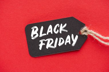 shopping sale tag with black friday sign on red
