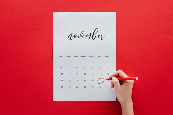 Partial View Woman Writing Black Friday Calendar November Isolated Red — Stock Photo, Image