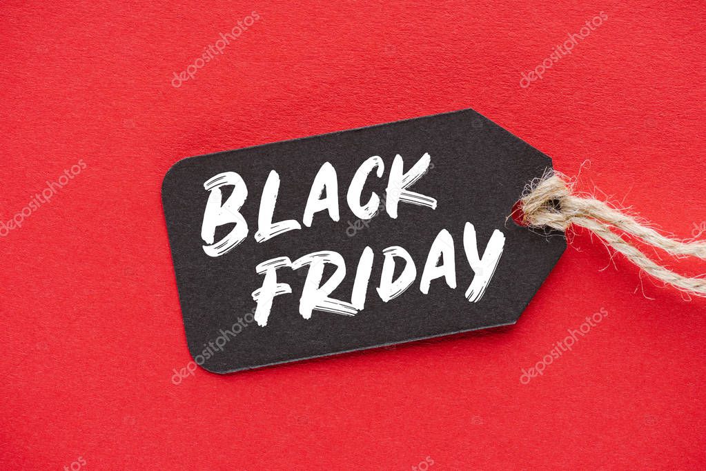 Shopping sale tag with black friday sign on red