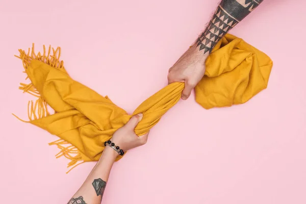 Partial View Tattooed Customers Pulling Yellow Scarf Isolated Pink — Stock Photo, Image