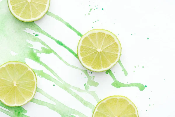 Pohled Shora Řez Limety Bílém Povrchu Zeleným Akvarel — Stock fotografie