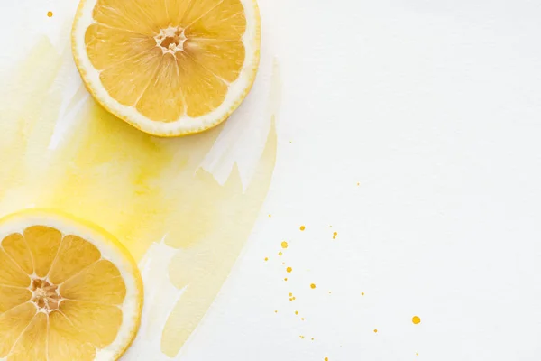 Top View Yummy Lemon Pieces White Surface Yellow Watercolor — Free Stock Photo