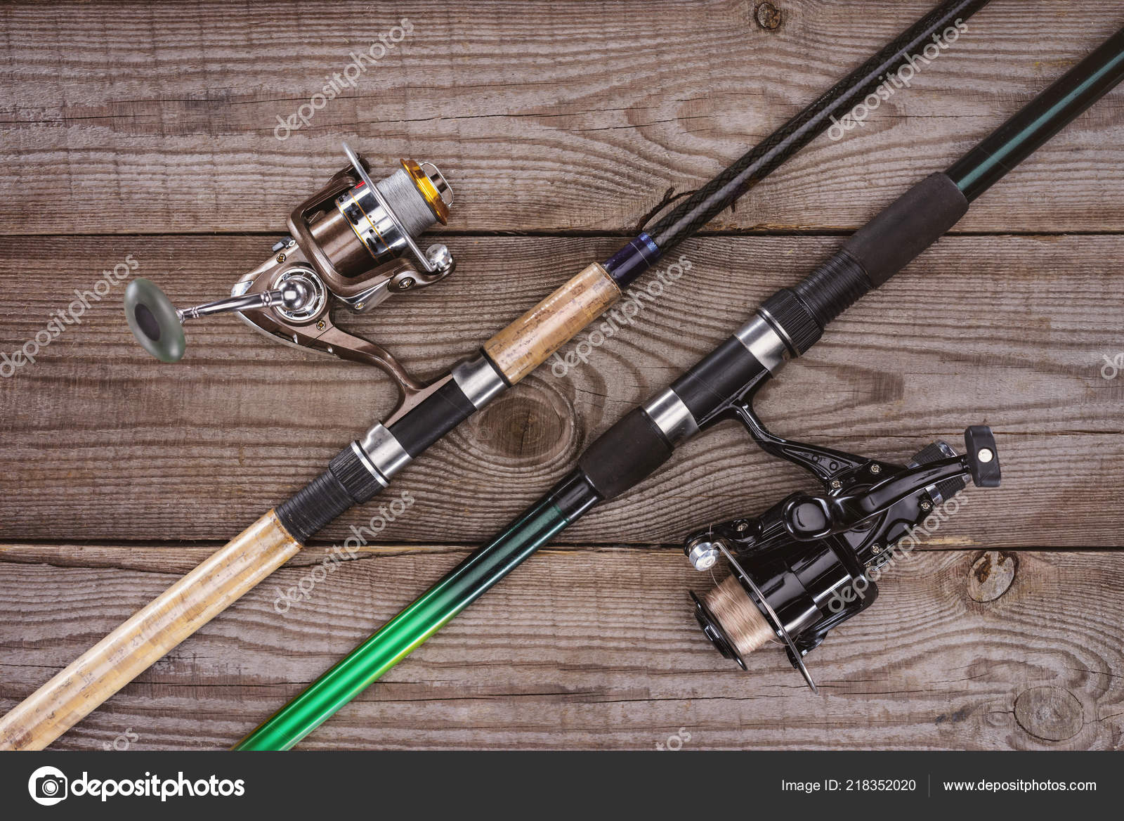 Fishing Rods And Reels With Line On Green Wooden Background, 46% OFF
