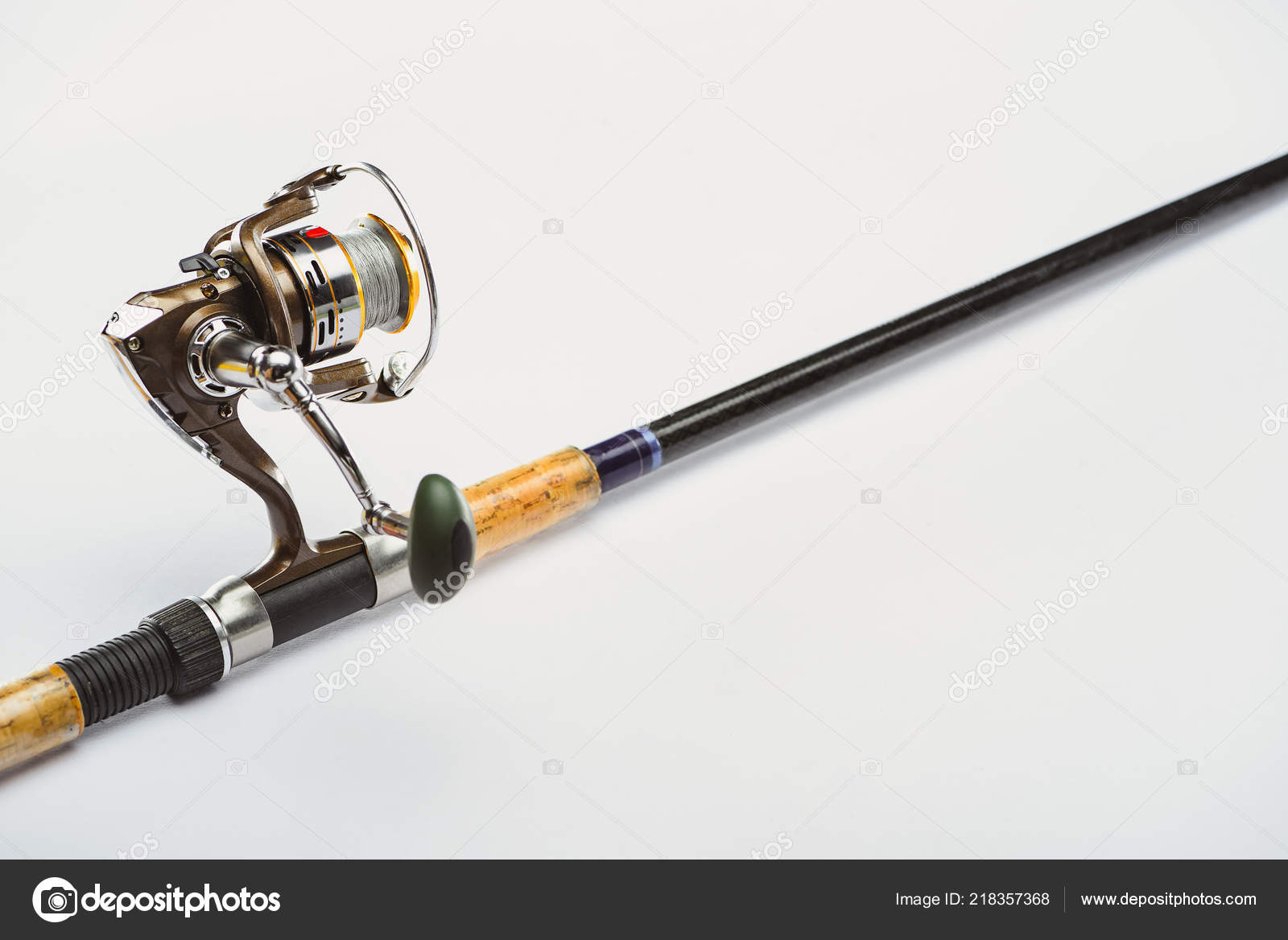Premium Photo  Compact fishing rod for fishing isolated on white