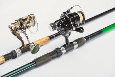 close up view of fishing rods isolated on white  clipart