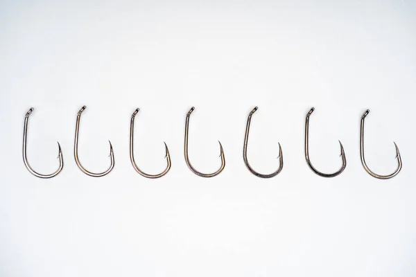 Top View Fishing Hooks Placed Row Isolated White — Free Stock Photo