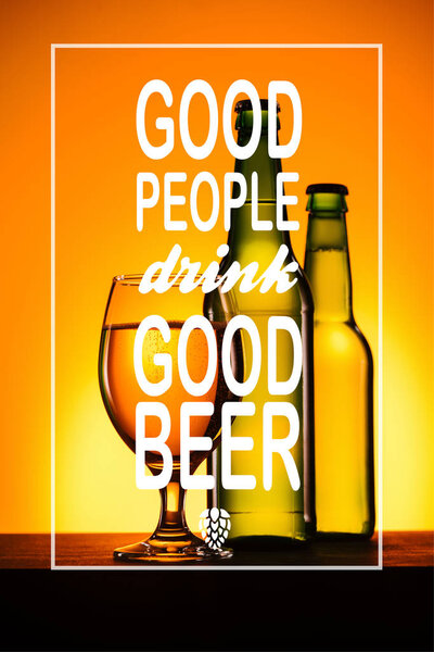 bottles and glass of beer on surface on orange background with "good people drink good beer" inspiration