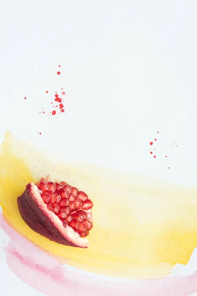 Top View Delicious Pomegranate White Surface Yellow Pink Watercolor Strokes — Free Stock Photo