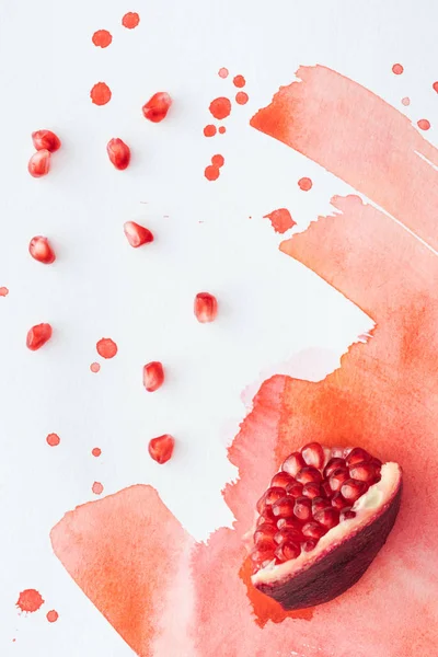 Top View Tasty Pomegranate Piece Seeds White Surface Red Watercolor — Stock Photo, Image