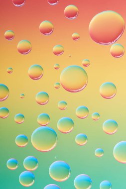 close-up view of beautiful calm transparent water drops on bright abstract background clipart