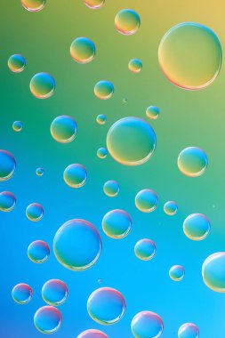 beautiful calm clean water drops on bright colorful background clipart