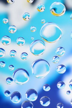 beautiful calm clean water drops on light blurred background  clipart