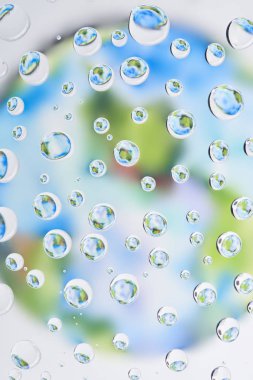 beautiful clear water drops on blurred abstract background clipart