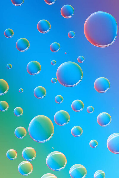 close-up view of beautiful calm transparent droplets on bright abstract background