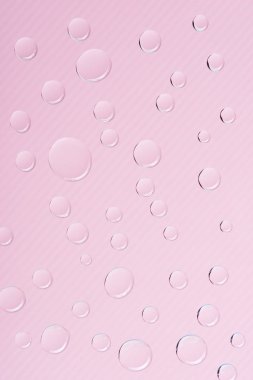 Şeffaf su görmek, pembe arka plan damla