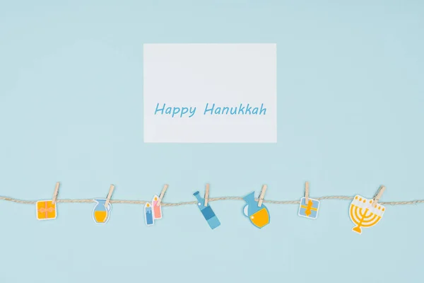 Top View Happy Hannukah Card Holiday Paper Signs Pegged Rope — Free Stock Photo