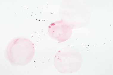abstract light pink watercolor splatters on white paper clipart