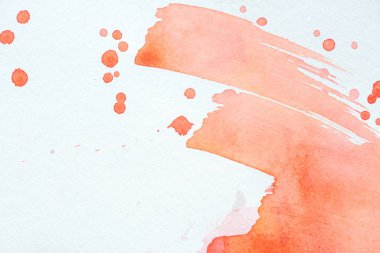 abstract red watercolor strokes and splatters on white paper clipart