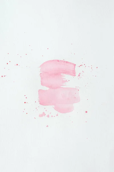 白い紙の上飛ぶと抽象的な光ピンク水彩ストローク — ストック写真