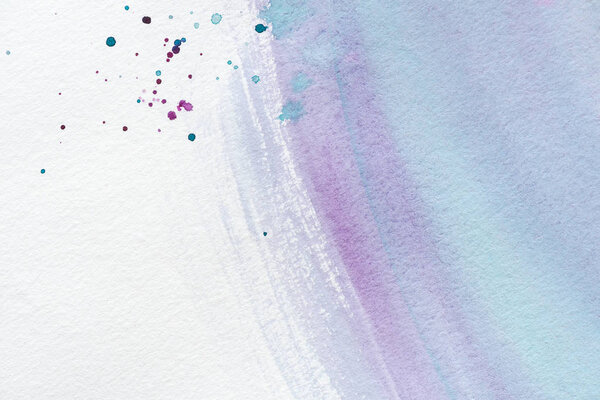 abstract wallpaper with violet and blue watercolor strokes and splatters on white paper