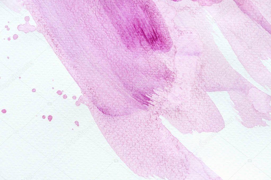 abstract violet watercolor strokes with splatters on white paper