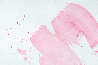 creative background with pink watercolor strokes and splatters on white paper clipart
