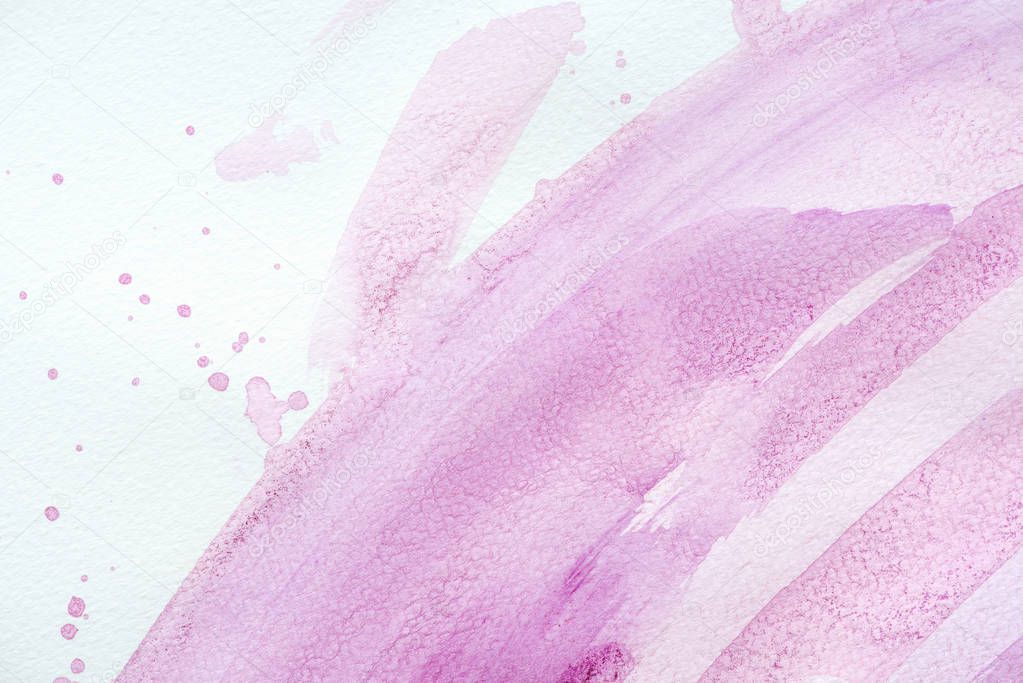 abstract background with purple watercolor strokes with splatters