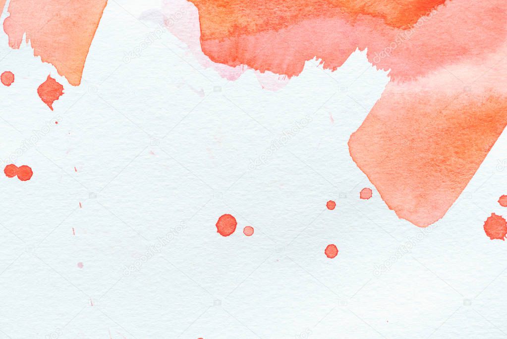 abstract red watercolor painting with strokes and splatters on white paper