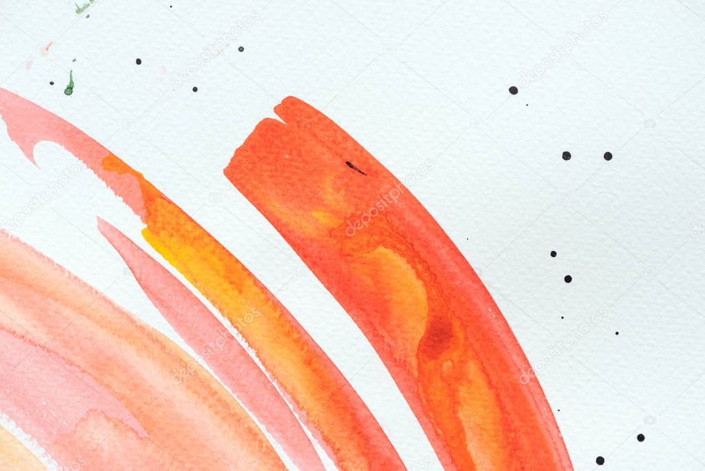 abstract colorful watercolor strokes on white paper