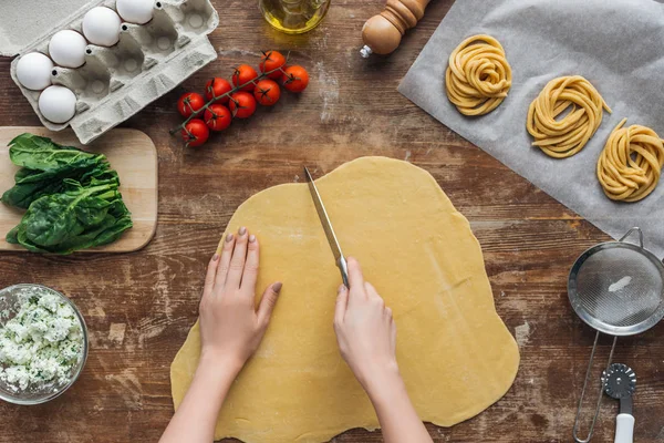 Top View Female Hands Cutting Raw Dough Wooden Table — Stock Photo, Image