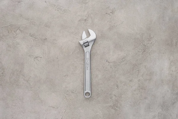 Top View Adjustable Pipe Wrench Lying Concrete Surface — Stock Photo, Image