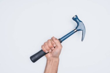 cropped shot of man holding hammer isolated on white clipart