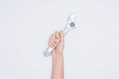 cropped shot of woman holding adjustable pipe wrench isolated on white clipart