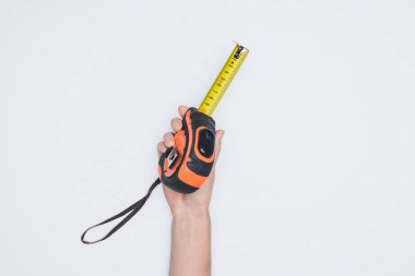 cropped shot of woman holding measuring tape tool isolated on white clipart