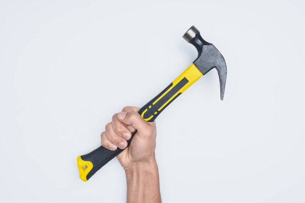 cropped shot of man holding hammer with rubber handle isolated on white