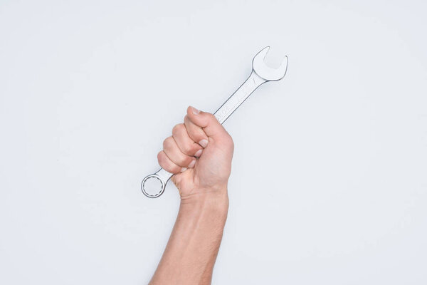 cropped shot of man holding wrench isolated on white