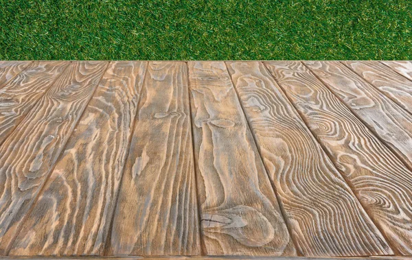 Surface Brown Wooden Planks Green Grass Background — Stock Photo, Image