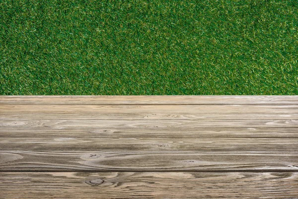 Template Brown Wooden Floor Green Grass Background — Stock Photo, Image