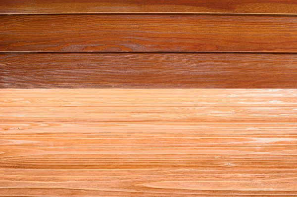 テンプレートの背景に茶色の板とオレンジ色の木の床の  — 無料ストックフォト