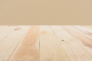 template of beige wooden floor made of planks on dark beige background clipart