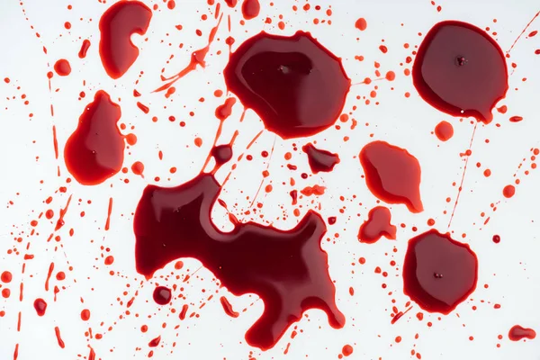 Nahaufnahme Chaotischer Bluttröpfchen Auf Weißer Oberfläche — Stockfoto