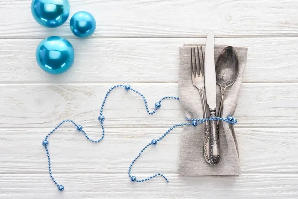 Top View Fork Knife Spoon Wrapped Decorative Blue Beads Christmas — Free Stock Photo