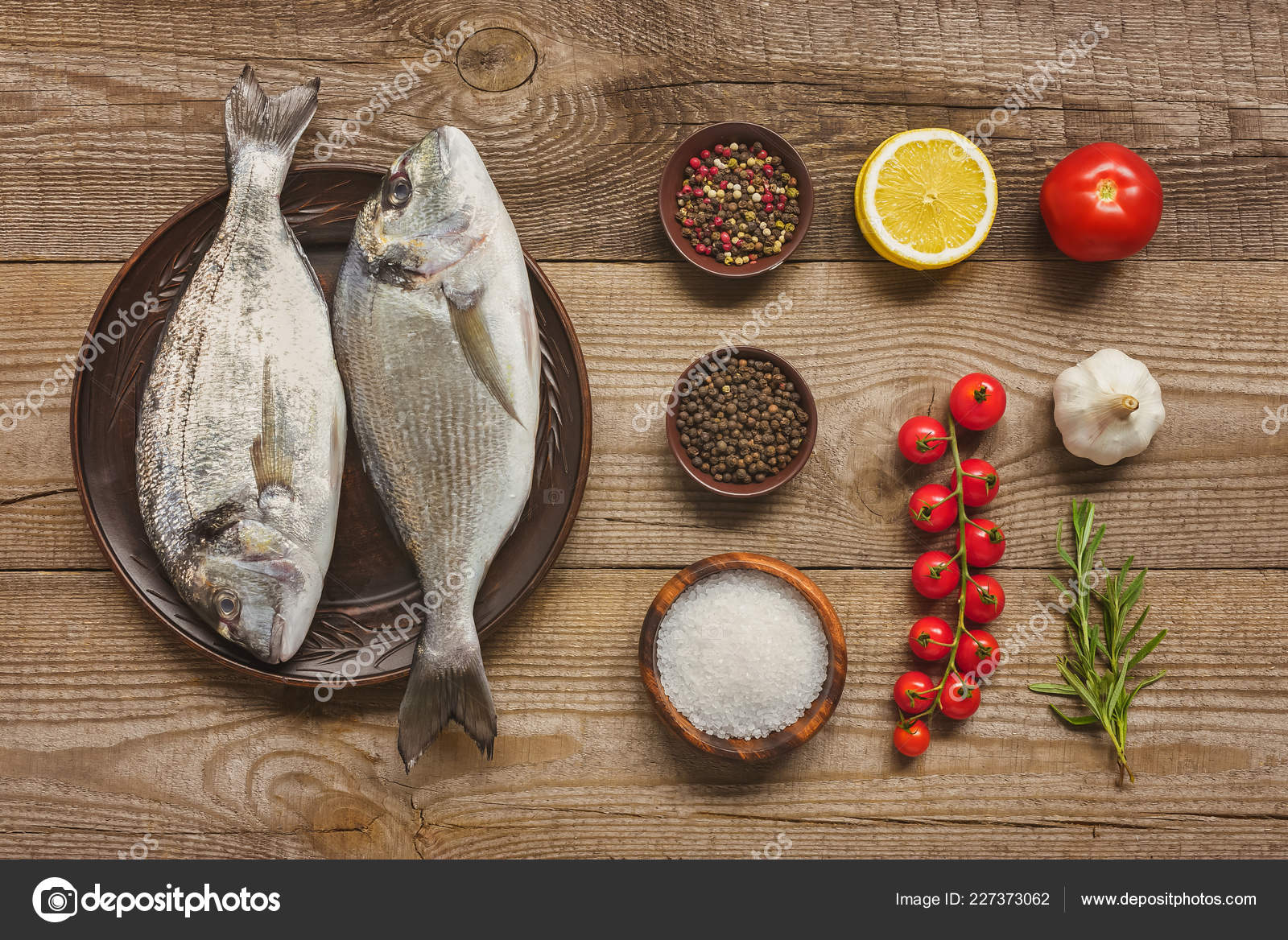 Elevated View Plate Uncooked Fish Arranged Ingredients Wooden Table ...
