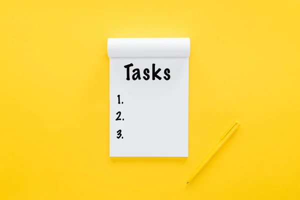 Top View Notebook Tasks List Yellow — Stock Photo, Image