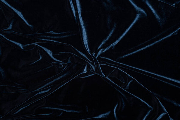 black shiny textile velour background with copy space