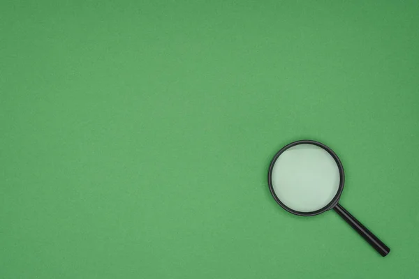 Top View Magnifying Glass Green Background — Stock Photo, Image