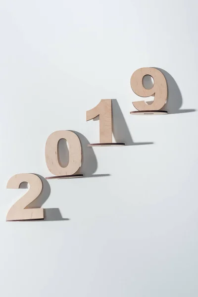 Top View 2019 Date Made Wooden Numbers White Background — Free Stock Photo