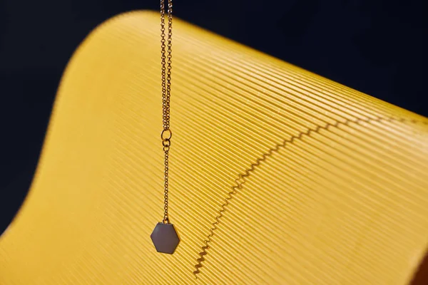 Beautiful Luxury Necklace Yellow Black Striped Surface — Stock Photo, Image