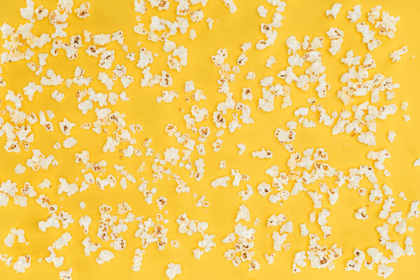 seamless pattern of fresh tasty popcorn isolated on yellow