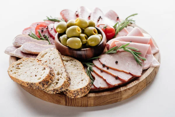 Cutting Board Delicious Salami Ham Olives Bowl Bread Herbs White — Stock Photo, Image